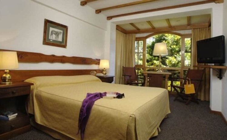 Imagen de la habitación del Hotel Y Caba&ntilde;as Le Village. Foto 8