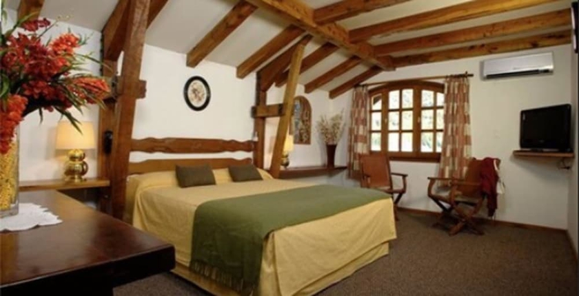 Imagen de la habitación del Hotel Y Caba&ntilde;as Le Village. Foto 11