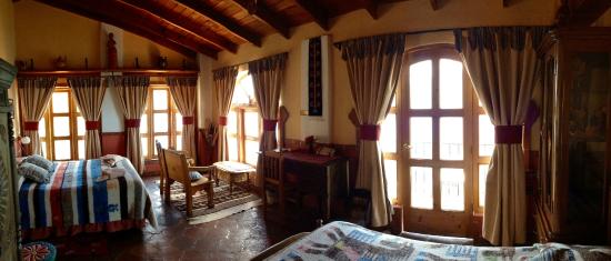 Imagen de la habitación del Hotel Y Cafe La Casa Del Mundo. Foto 4