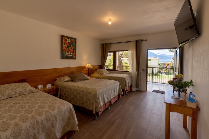 Imagen de la habitación del Hotel Y Centro De Convenciones Jardines Del Lago. Foto 8