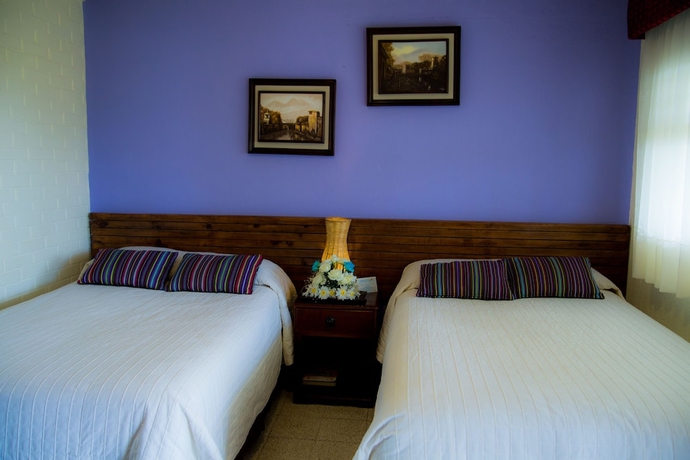 Imagen de la habitación del Hotel Y Centro De Convenciones Jardines Del Lago. Foto 15