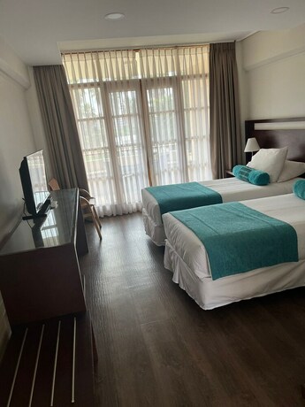 Imagen de la habitación del Hotel Y Departamentos La Serena. Foto 24