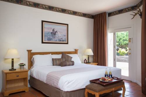Imagen de la habitación del Hotel Y O Ranch. Foto 7