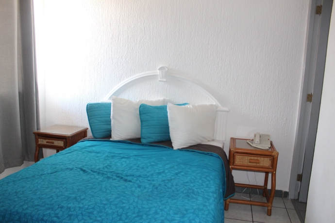 Imagen de la habitación del Hotel Y Suites Bausan. Foto 6