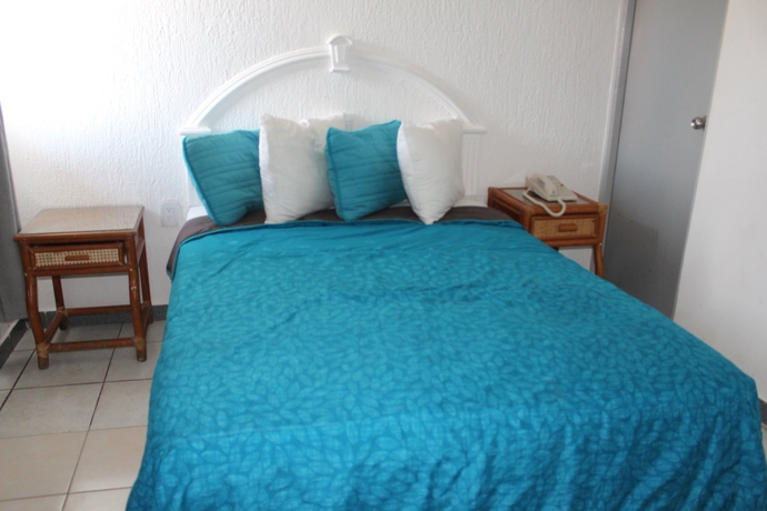 Imagen de la habitación del Hotel Y Suites Bausan. Foto 7