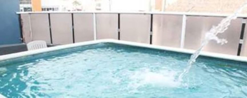 Imagen de la piscina del Hotel Y Suites Bausan. Foto 18