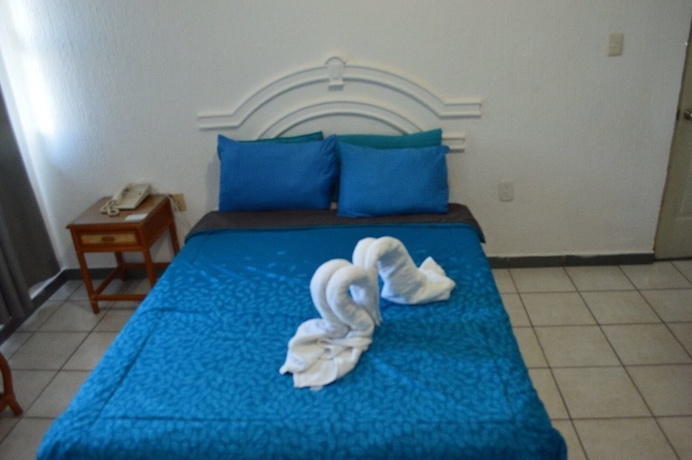 Imagen de la habitación del Hotel Y Suites Bausan. Foto 11