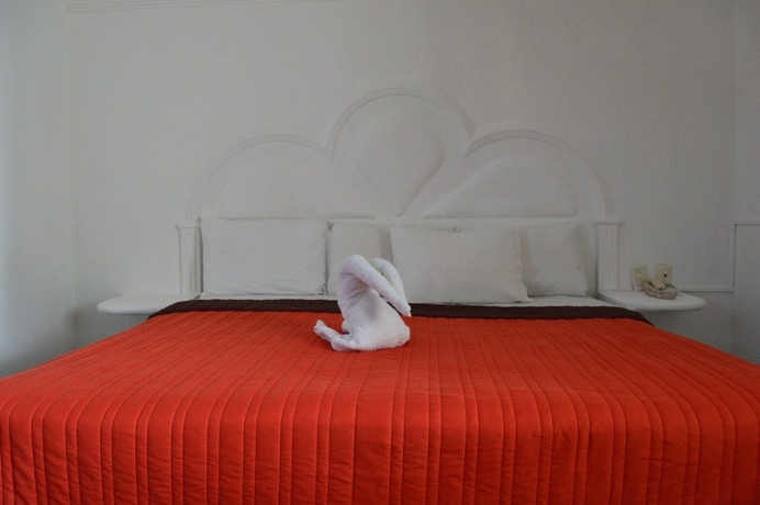 Imagen de la habitación del Hotel Y Suites Bausan. Foto 12