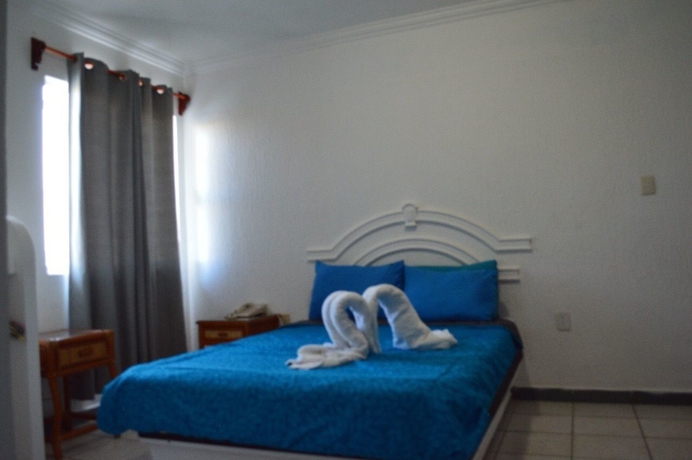 Imagen de la habitación del Hotel Y Suites Bausan. Foto 14