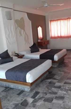 Imagen de la habitación del Hotel Y Suites Plaza Manzanillo. Foto 2