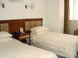 Imagen de la habitación del Hotel YIN FA. Foto 3