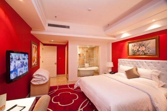 Imagen de la habitación del Hotel YINHAO HOLIDAY HOTEL. Foto 4