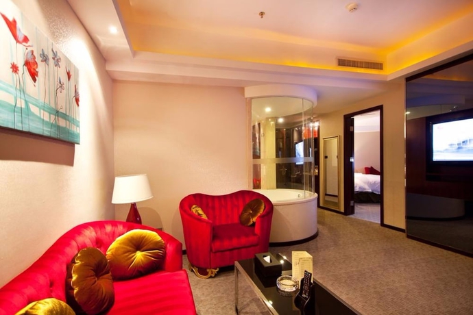 Imagen de la habitación del Hotel YINHAO HOLIDAY HOTEL. Foto 8