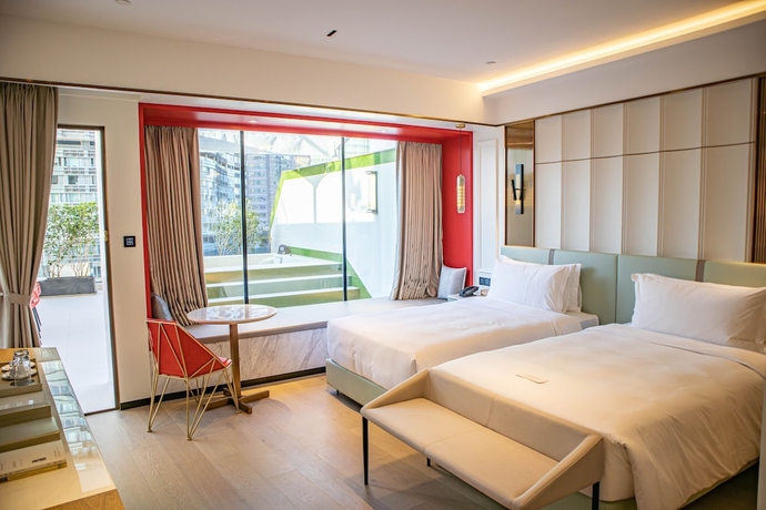 Imagen de la habitación del Hotel YOHO Resorts World. Foto 2