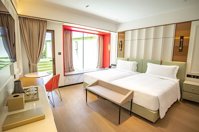 Imagen de la habitación del Hotel YOHO Resorts World. Foto 11