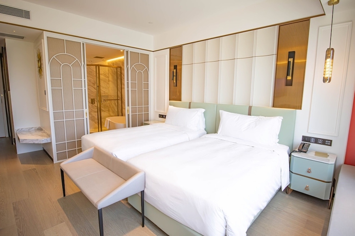 Imagen de la habitación del Hotel YOHO Resorts World. Foto 13