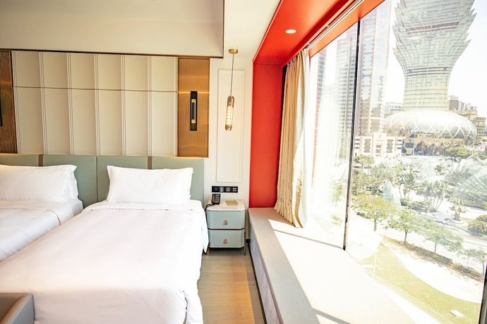 Imagen de la habitación del Hotel YOHO Resorts World. Foto 16