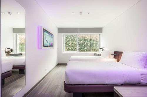 Imagen de la habitación del Hotel YOTEL Tokyo Ginza. Foto 18