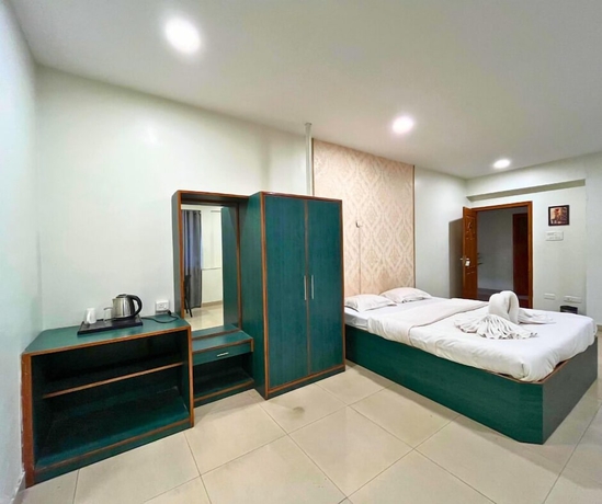 Imagen de la habitación del Hotel YSM Grand, Guwahati. Foto 4
