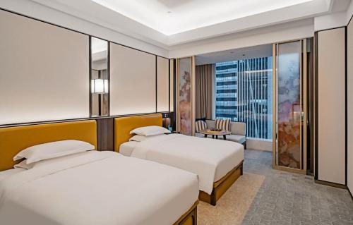 Imagen de la habitación del Hotel YTL ChangChengYunYue. Foto 17