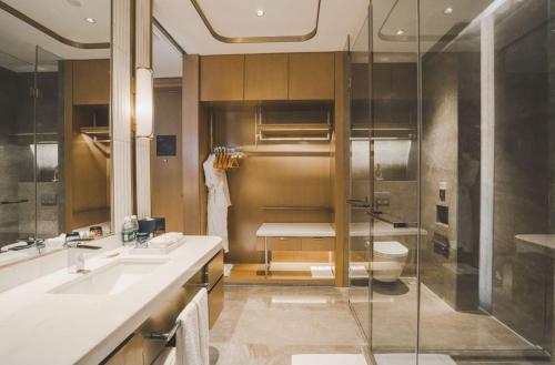 Imagen de la habitación del Hotel YTL OuYue International. Foto 16