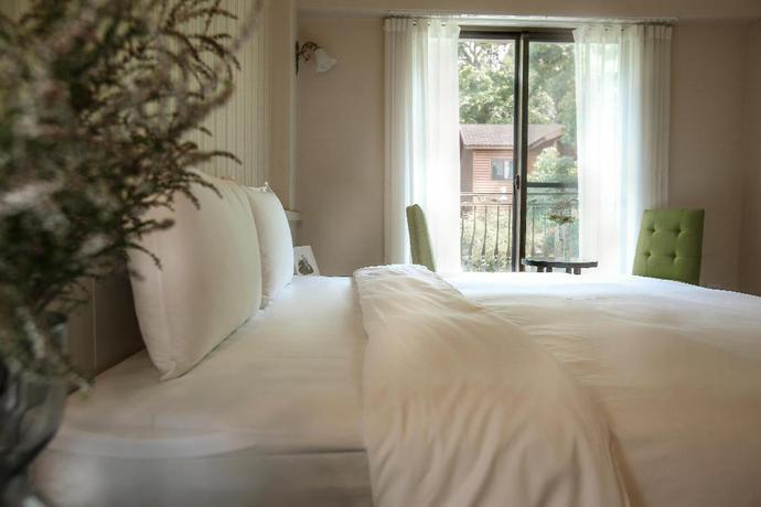 Imagen de la habitación del Hotel YU SHEN JING RESORT. Foto 6