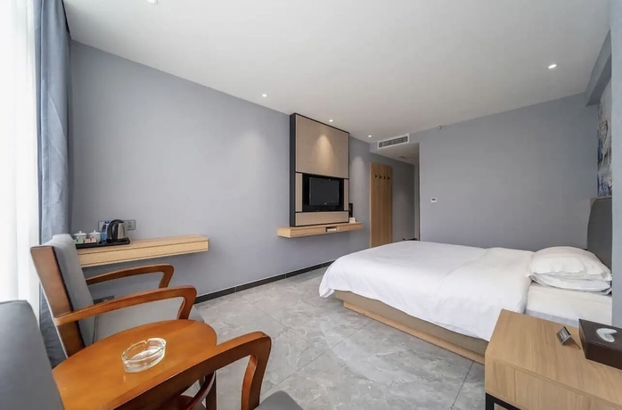 Imagen de la habitación del Hotel YUAN FENG HOTEL. Foto 7