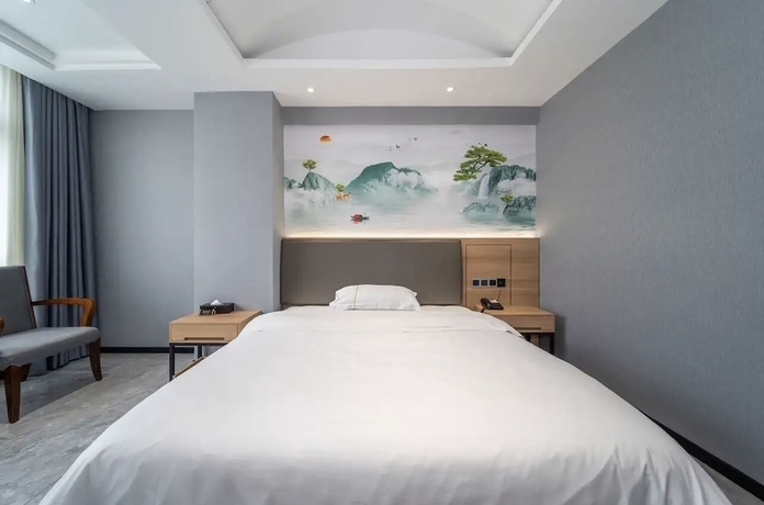 Imagen de la habitación del Hotel YUAN FENG HOTEL. Foto 9