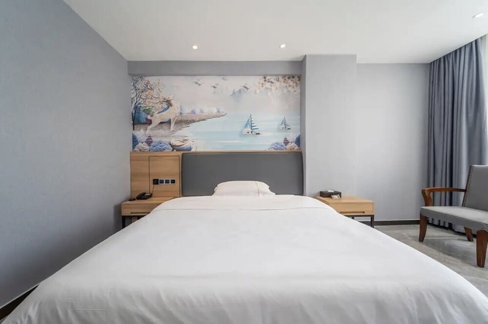 Imagen de la habitación del Hotel YUAN FENG HOTEL. Foto 12