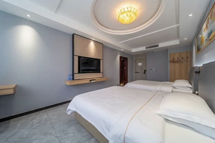 Imagen de la habitación del Hotel YUAN FENG HOTEL. Foto 13