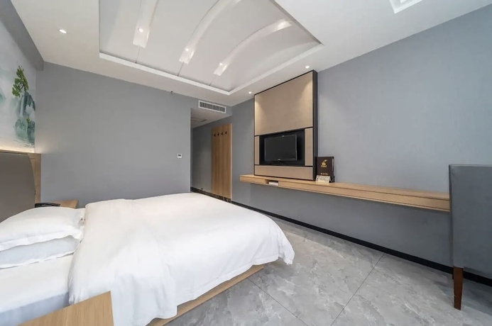 Imagen de la habitación del Hotel YUAN FENG HOTEL. Foto 14