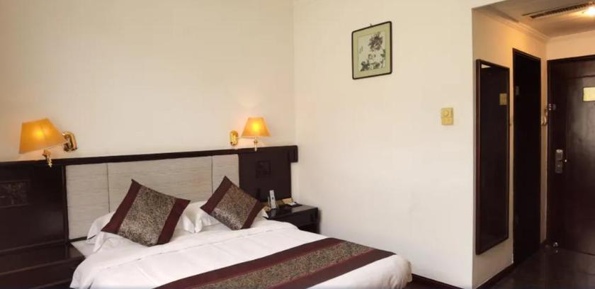 Imagen de la habitación del Hotel YUANHUA INTERNATIONAL HOTEL. Foto 4