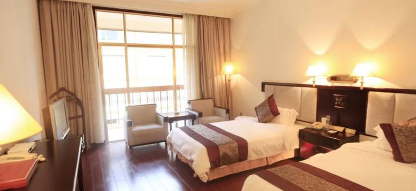 Imagen de la habitación del Hotel YUANHUA INTERNATIONAL HOTEL. Foto 7