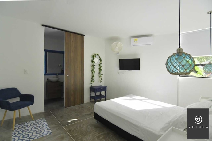 Imagen de la habitación del Hotel YULUKA HOSTEL. Foto 1