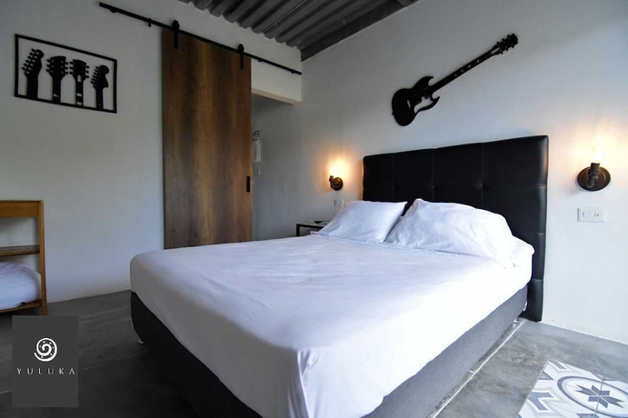 Imagen de la habitación del Hotel YULUKA HOSTEL. Foto 4