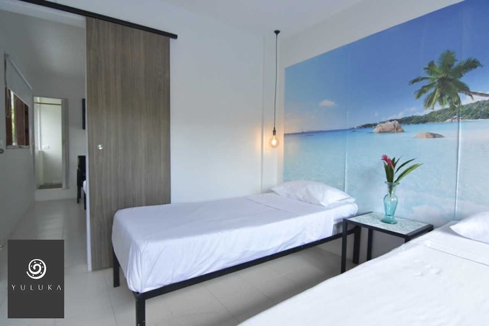 Imagen de la habitación del Hotel YULUKA HOSTEL. Foto 6