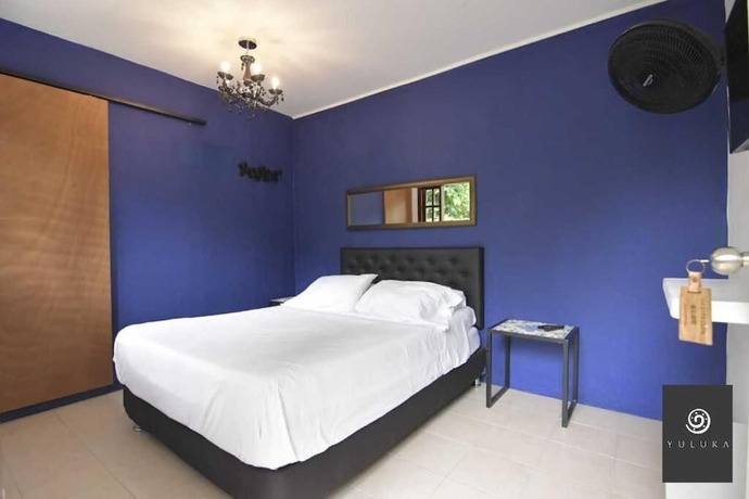 Imagen de la habitación del Hotel YULUKA HOSTEL. Foto 8