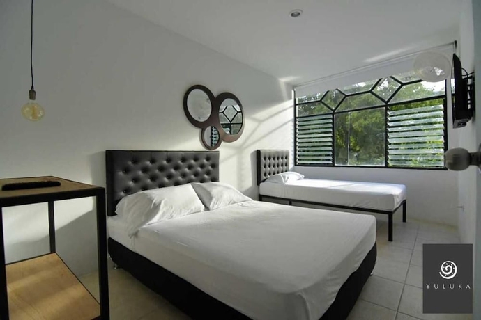 Imagen de la habitación del Hotel YULUKA HOSTEL. Foto 9