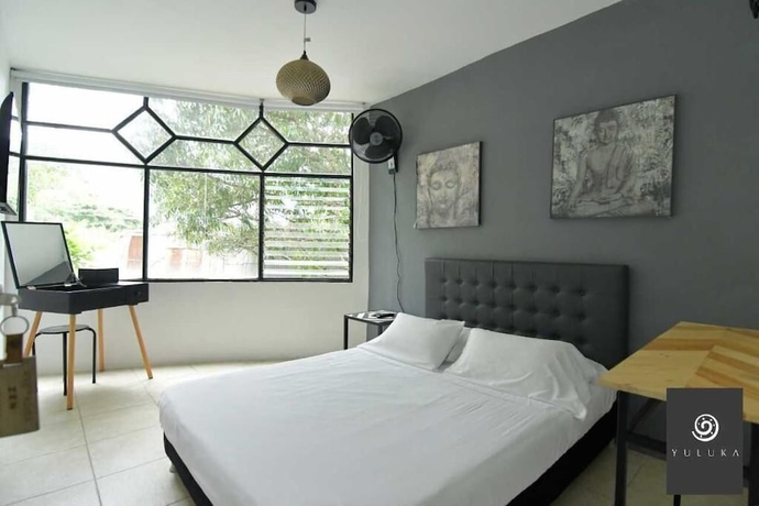 Imagen de la habitación del Hotel YULUKA HOSTEL. Foto 11