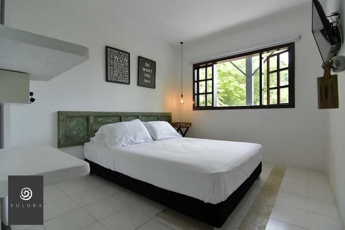 Imagen de la habitación del Hotel YULUKA HOSTEL. Foto 13