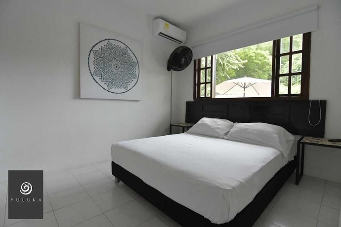Imagen de la habitación del Hotel YULUKA HOSTEL. Foto 14