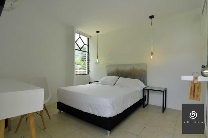 Imagen de la habitación del Hotel YULUKA HOSTEL. Foto 15