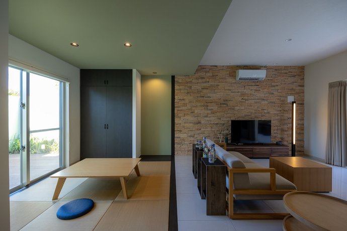 Imagen de la habitación del Hotel YUMIHA OKINAWA. Foto 11