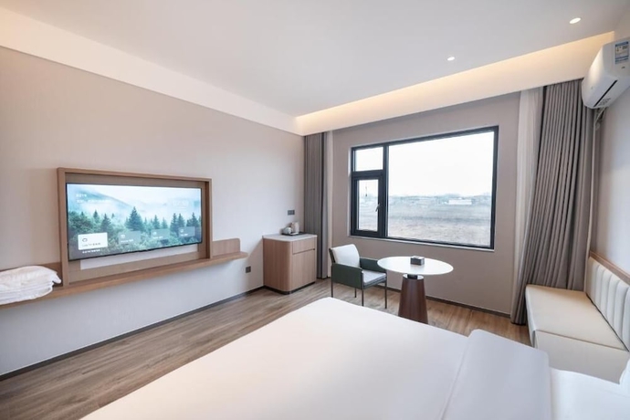 Imagen de la habitación del Hotel YUNMANJIANYE HOTEL. Foto 1