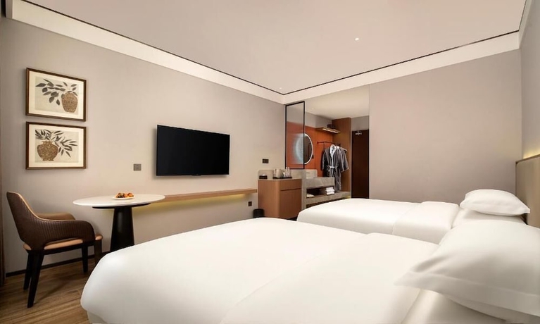 Imagen de la habitación del Hotel YUNMANJIANYE HOTEL. Foto 3