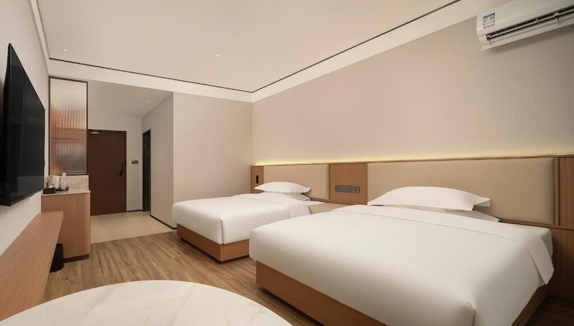 Imagen de la habitación del Hotel YUNMANJIANYE HOTEL. Foto 4