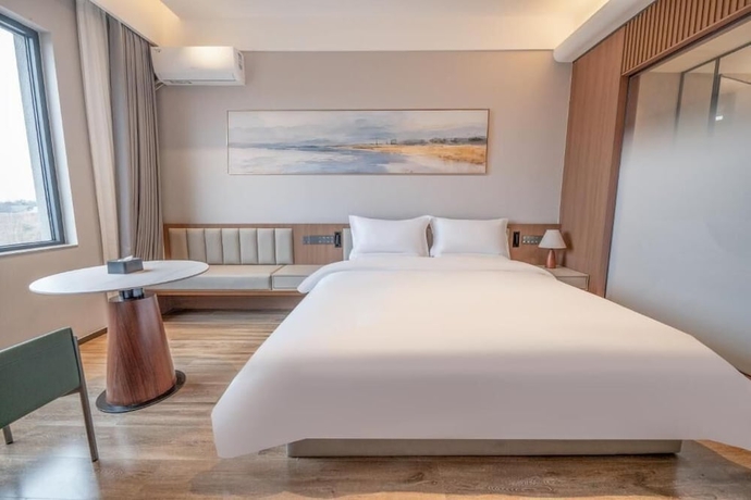 Imagen de la habitación del Hotel YUNMANJIANYE HOTEL. Foto 14