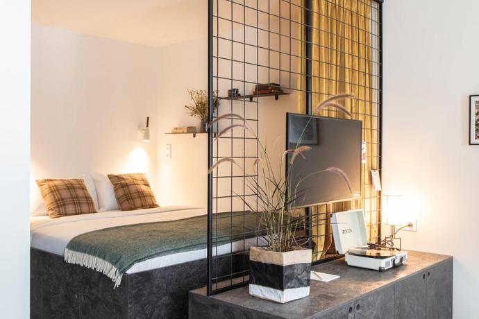 Imagen de la habitación del Hotel YUST Liège. Foto 5