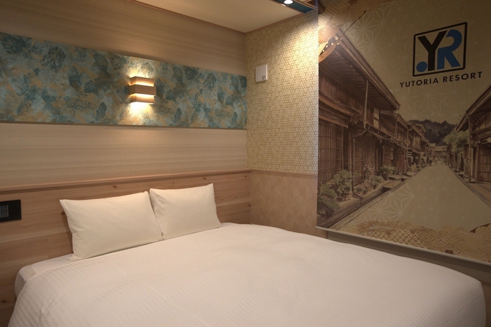 Imagen de la habitación del Hotel YUTORIA RESORT HIDATAKAYAMA. Foto 4