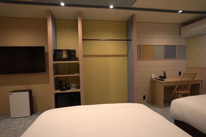 Imagen de la habitación del Hotel YUTORIA RESORT HIDATAKAYAMA. Foto 12